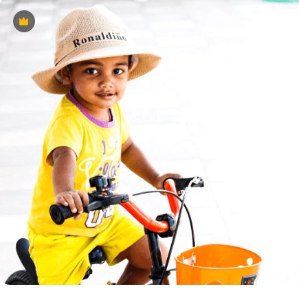 BOY on bicycle